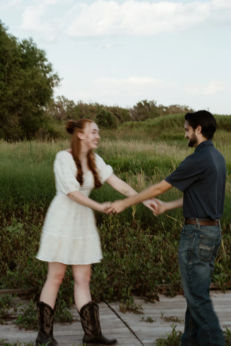 Abby and Collin sitting together in the grass