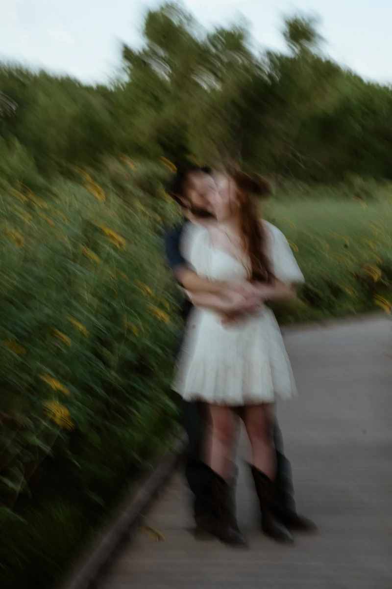 Abby and Collin twirling at dusk